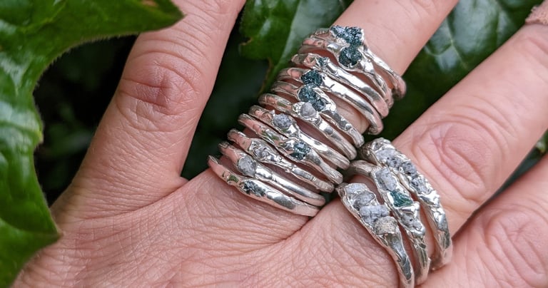 Lagoon rings incorporating raw diamonds