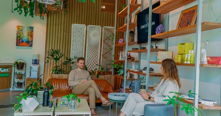 a man and woman sitting in a room