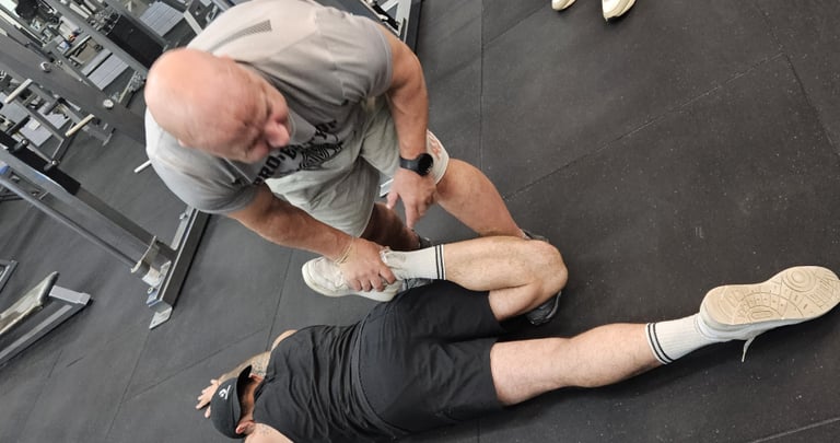 Partner-assisted stretching for mobility in guided end-range work to improve hips an