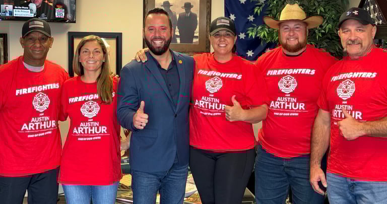 Firefighters standing with Austin Arthur in support of his leadership across Winter Garden and West 