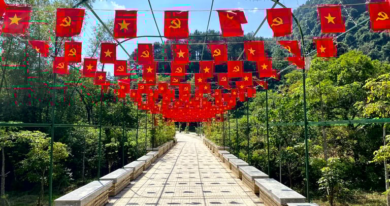 a bridge with flags and flags hanging from the side