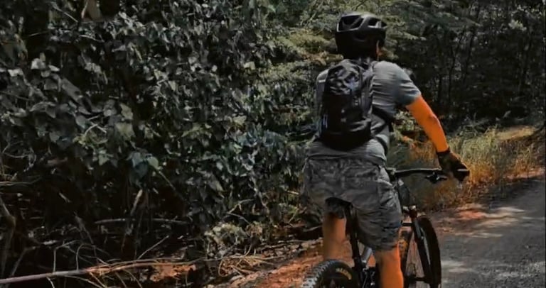 a man riding a eMTB down at Los Pozos