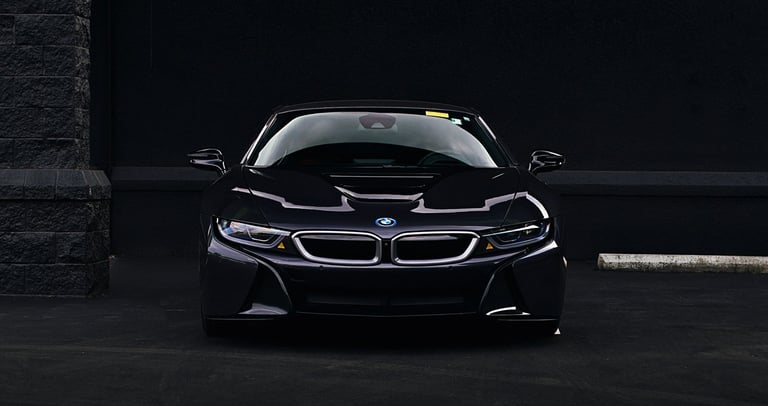 Sleek, black, and elegant BMW Coupe car photos taken at 704 Exotics in Charlotte, North Carolina.