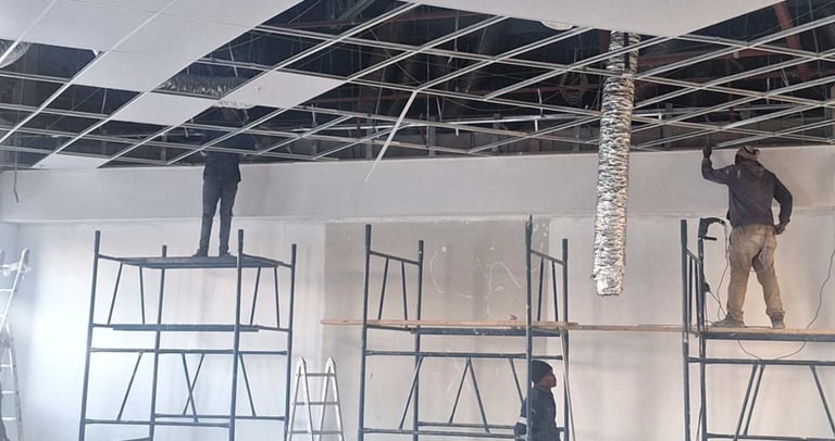 Commercial ceiling renovation – Belair Mall tenant improvements with ducting and grid ceiling