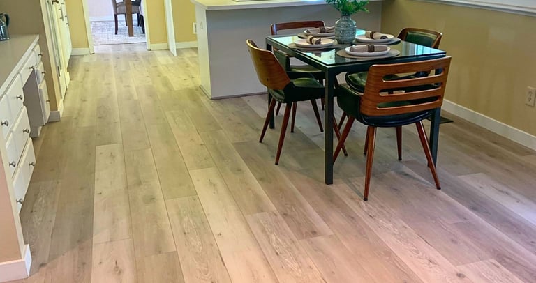a dining room with a table and chairs
