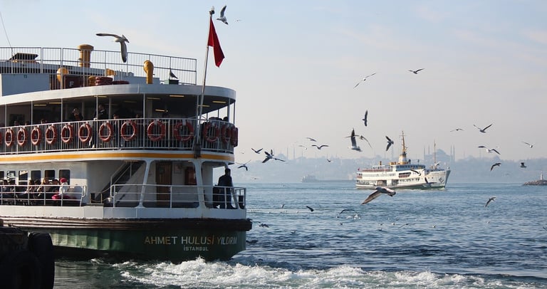 Greek ferry sailing between islands on a clear September day
