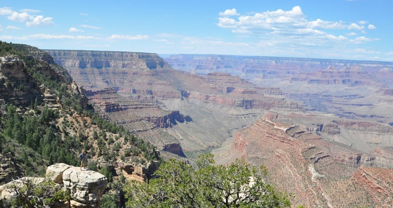 a cliff overlooking the grand canyon