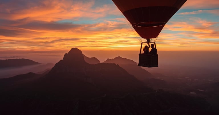 couple on romantic sunrise hot air balloon ride