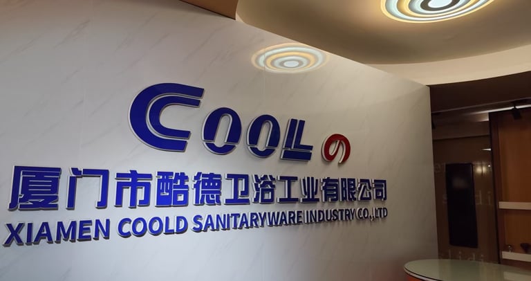 Office reception area featuring Xiamen Coold Sanitaryware Industry Co., Ltd. corporate logo wall.