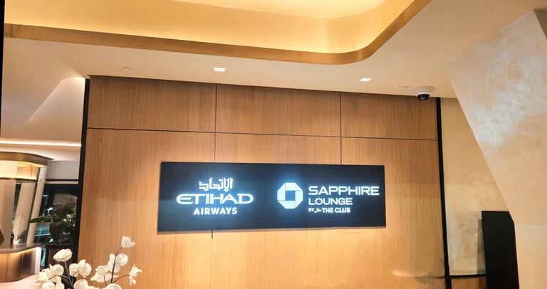 Entrance desk and sign of the Chase Sapphire Lounge by the club Etihad Airways JFK Terminal 4