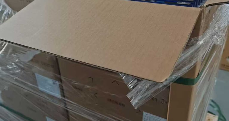 EVE lithium cells in carton boxes arranged on a pallet in a warehouse