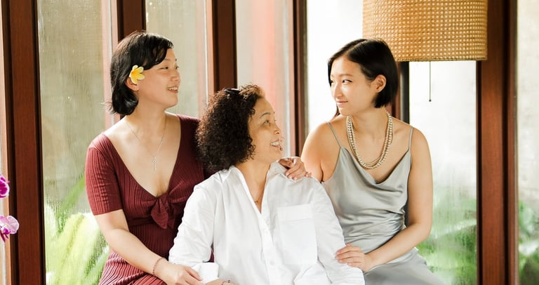 Three-generation family portrait at Bvlgari Resort Uluwatu Bali private villa terrace, family photography in Bali