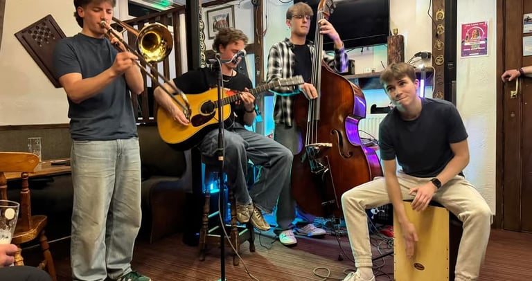An image of Jamie Walker performing on his Double Bass with a quartet