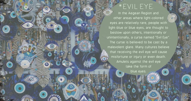 a wall hanging with evil eye eyeballs and evil eyeballs