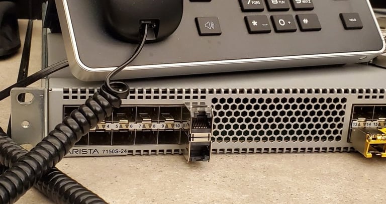 VoIP phone on a network device