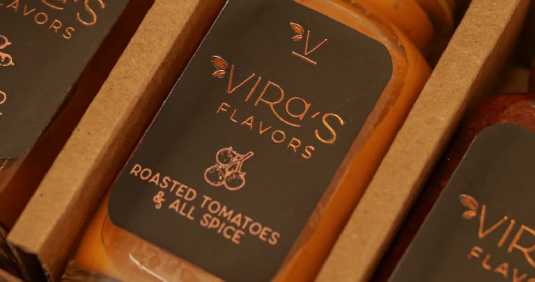 a box of three bottles of sauce