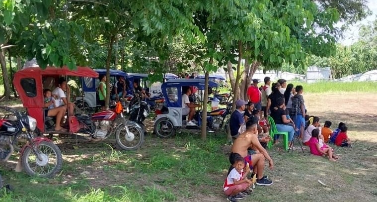 Local crowd gathered for a football game at Centro Recreacional Mokanranko in Santa Martha Pucallpa 