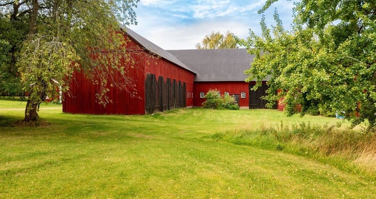 Large farm building painted with breathable heritage exterior wood paint
