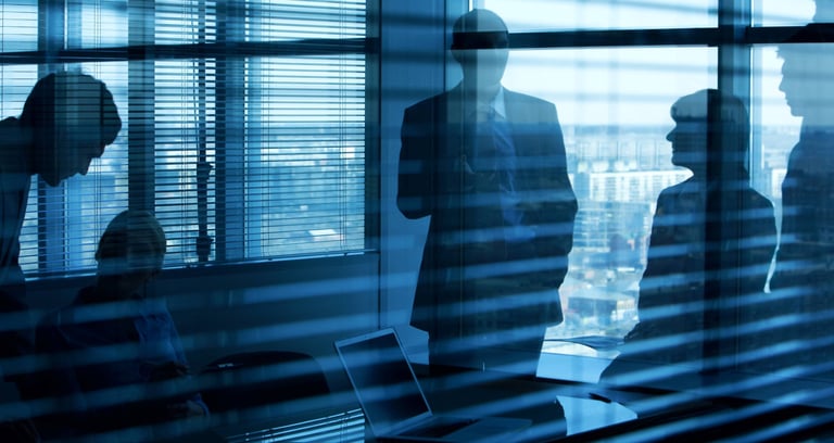 ng tpicture through a window of a team discussiogether into a closed room