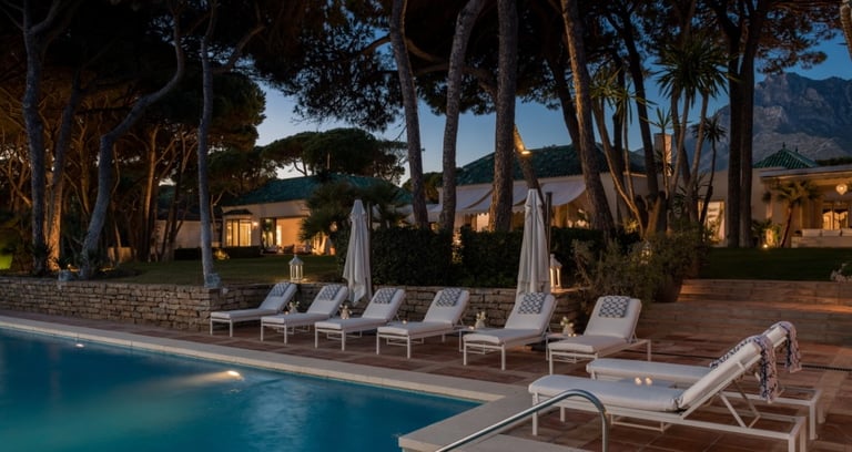 Dusk view over the pool area at Villa El Rincon