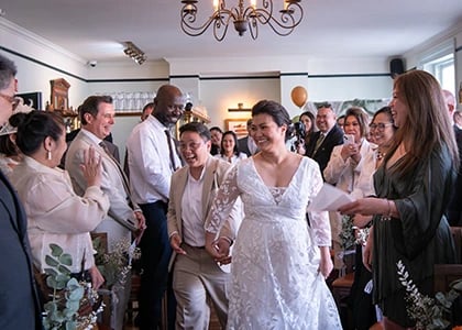 wedding couple arriving at their ceremony at The Admiral Hardy Greenwich