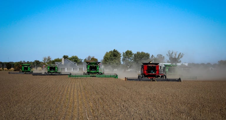 Photo of a farm with agricultural machinery