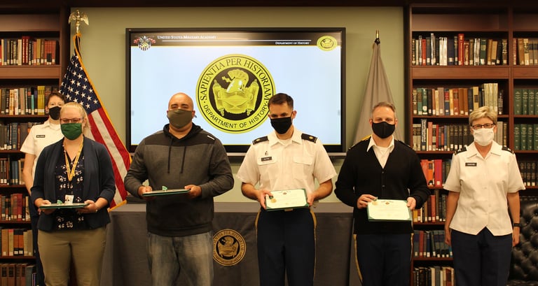 Laura Hooton (left) and other History Department members at an award ceremony at West Point, 2022