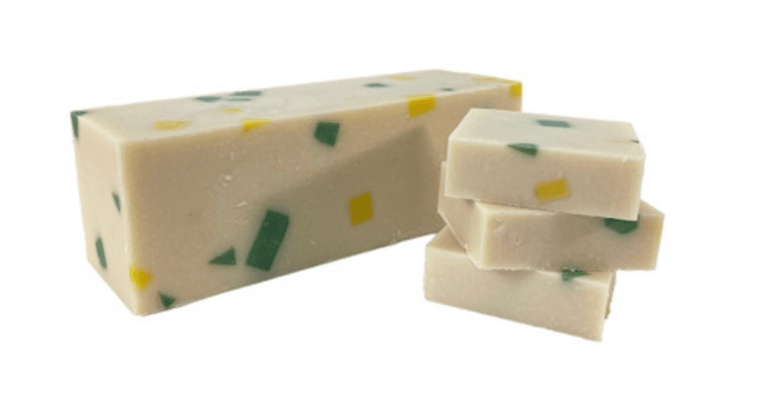 a soap bar with a white and yellow soap