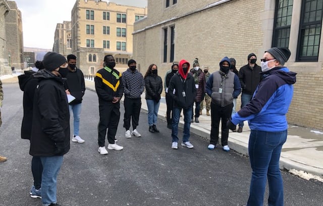 Dr. Hooton discussing first Black cadets outside Nininger Hall, West Point