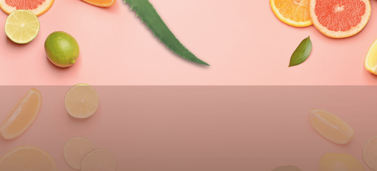 a group of citrus fruits and lemonade slices