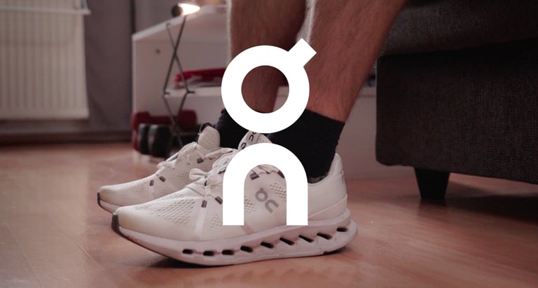 a person standing on a wooden floor with white shoes