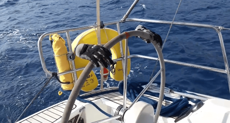 a boat steered by gloves. Copyright Vincent Volpe