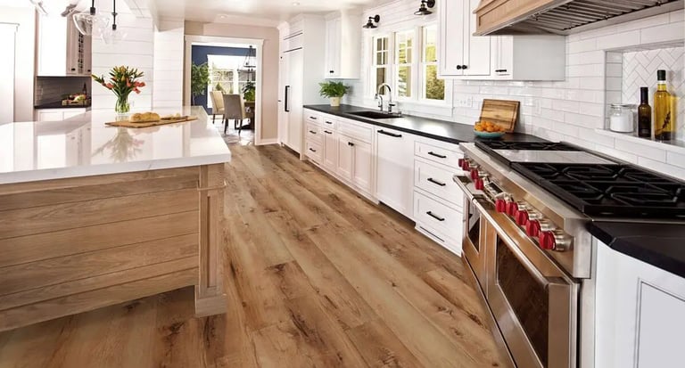 Luxury vinyl plank flooring in a modern kitchen offering waterproof durability and wood-look style.