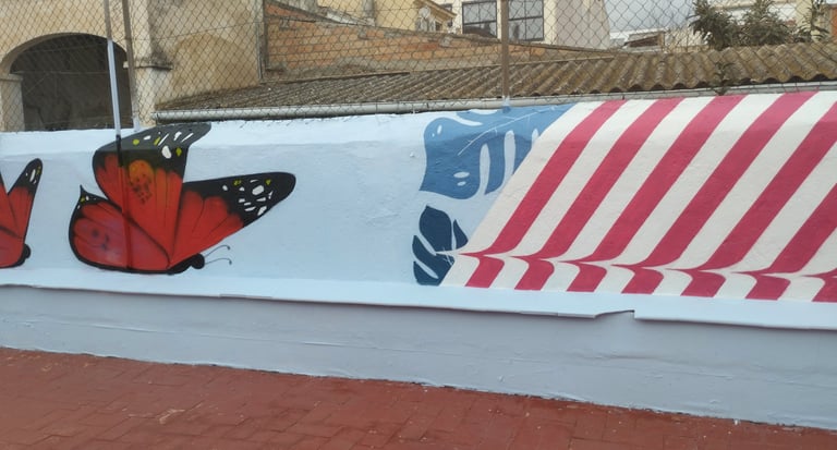 graffiti mural escuela mariposas tramas colores