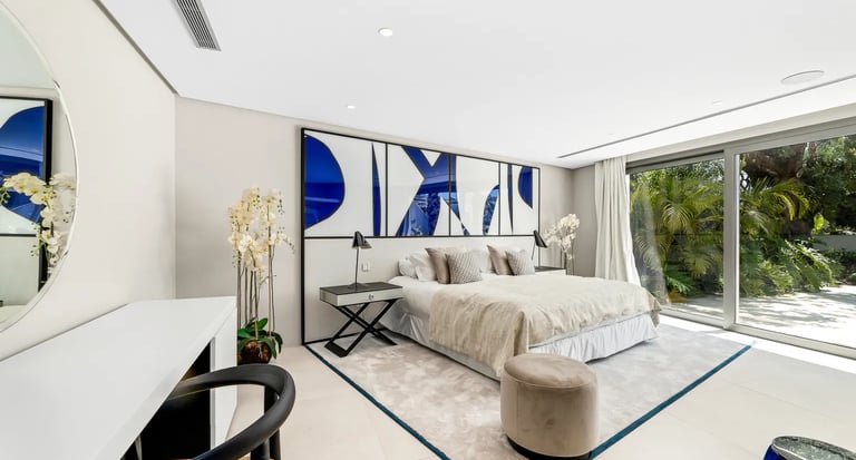 Contemporary bedroom with terrace views at Villa Serenity