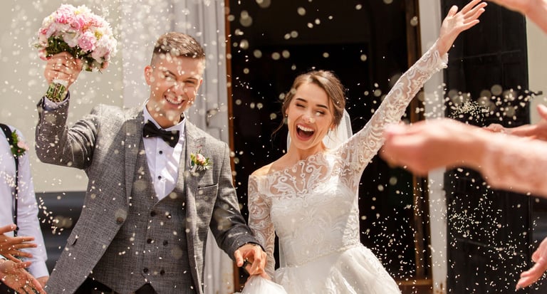 Wedding videographer Glasgow shooting joyful confetti moment at outdoor ceremony in Central Scotland