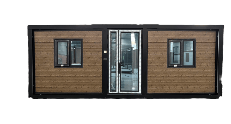 Modern portable cabin with wood-grain siding, black window frames, and glass double doors.