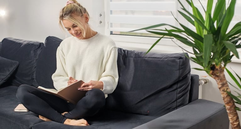 Calm morning routine with journaling and tea to support stress relief and relaxation