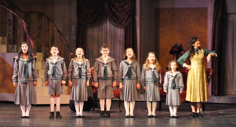 a group of people standing on a stage