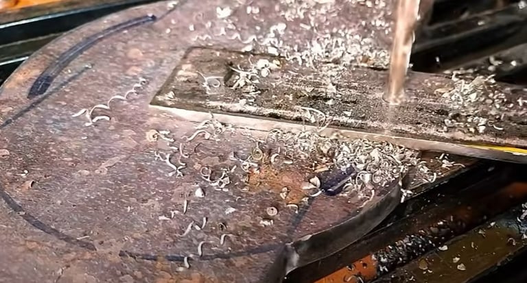 Picture showing the drilling of a compound slide base