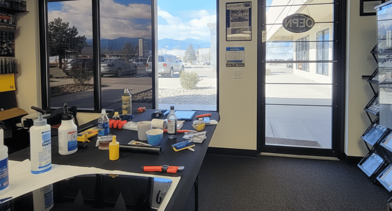 UV Protection Film being installed on Office Windows | All Floors Pueblo
