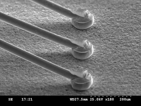 Ball wire bonding on semiconductor bond pads