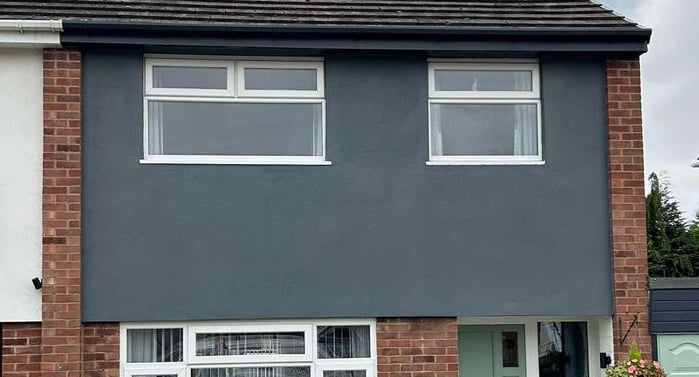 Front of a house rendered with smooth finish by Franklins Plastering