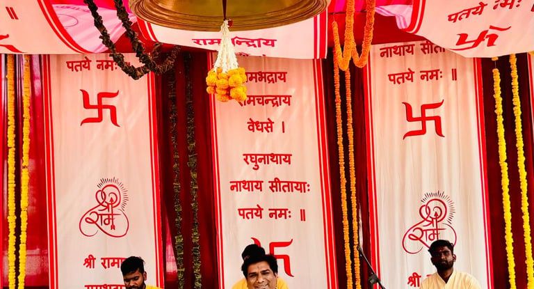 Indian musicians performing devotional bhajan music at a Hindu temple with a brass bell and traditional instruments.