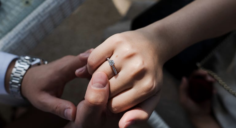 Close up engagement ring moment during intimate proposal at Sofitel Nusa Dua Bali