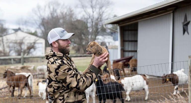 Joel Kasak with animals
