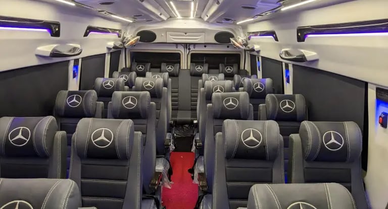 26 seater luxury tempo traveller interior on rent in Delhi for weddings and large group travel