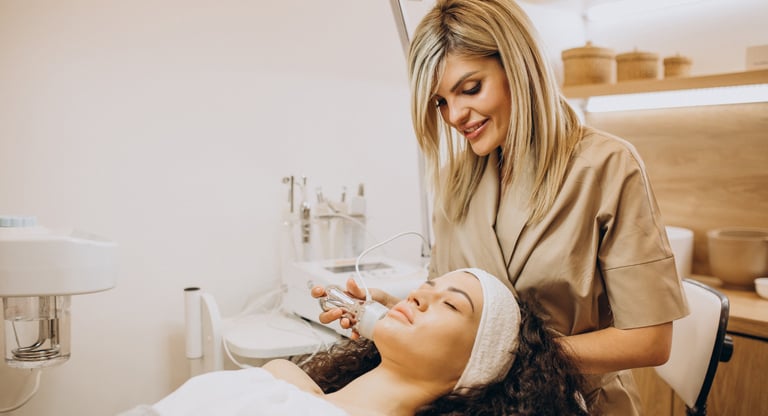 a woman getting a facial lift in a beauty salon