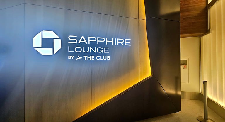 Chase Sapphire Lounge by The Club entrance sign with Chase logo, JFK Terminal 4