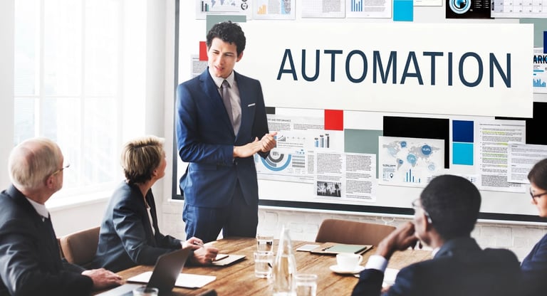 Business team strategizing the implementation of Automation Using AI